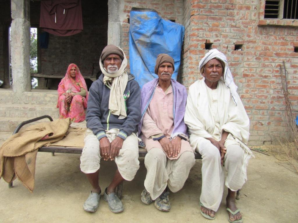 12final-Hare Ram Yadav (middle) and Vasant Chouhan (left) with fellow farmer from Bansgaon