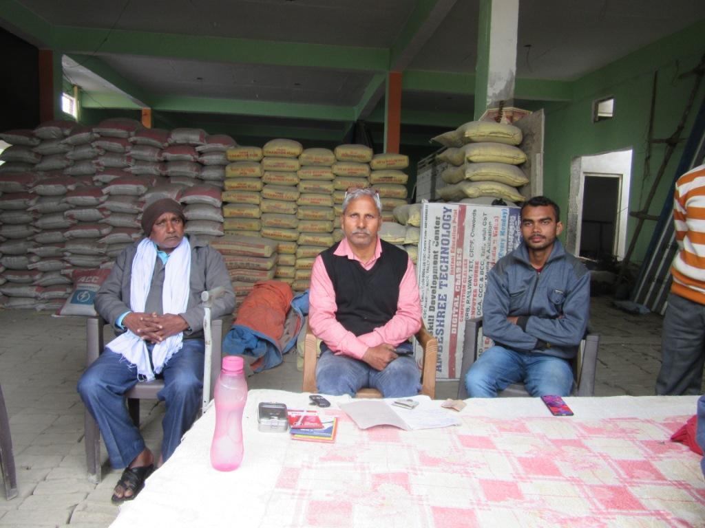 4Final-Ashwini Kumar from Bansgaon, flanked by business associates.JPG